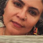 Impedimento salida del país a mujer que ultrajó himno de RD